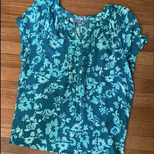 Green with white flowers. Green and white. Size large. By Laura scottl.